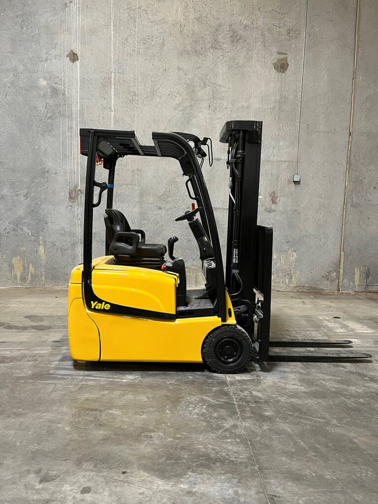 Forklift in concrete warehouse