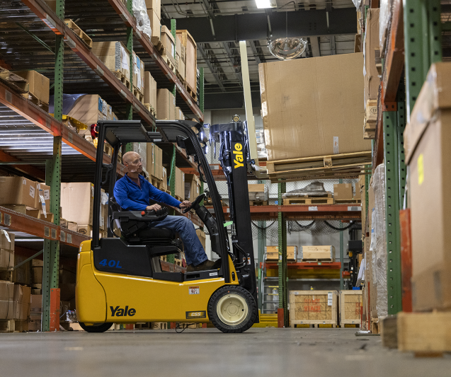 Man driving Yale forklift
